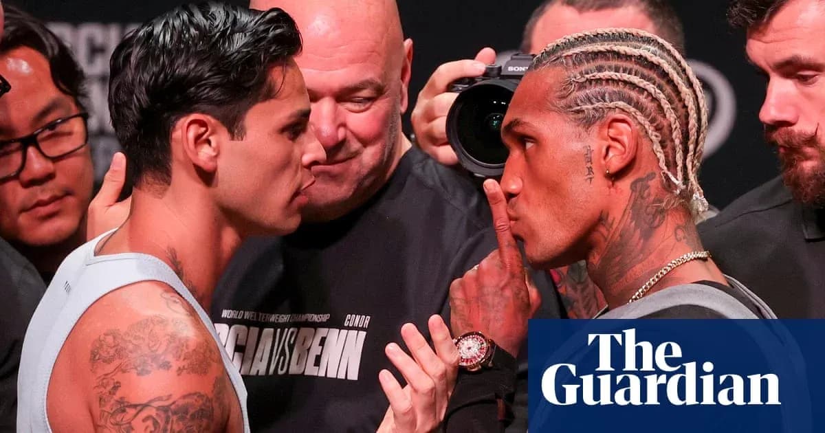 Two boxers facing off at weigh-in event