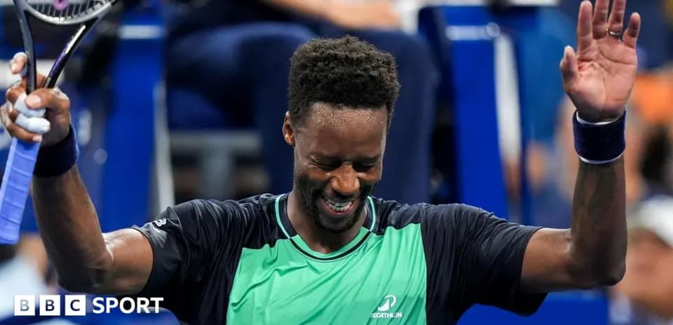 Tennis player celebrating after winning a match