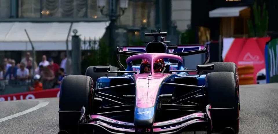 Formula 1 car racing on city street circuit