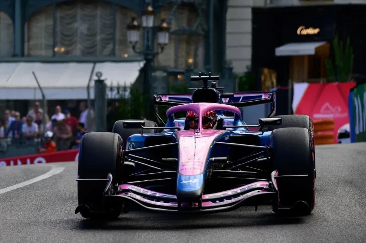 Formula 1 car racing on city street circuit