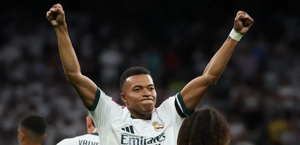 Player celebrating with raised fists after scoring