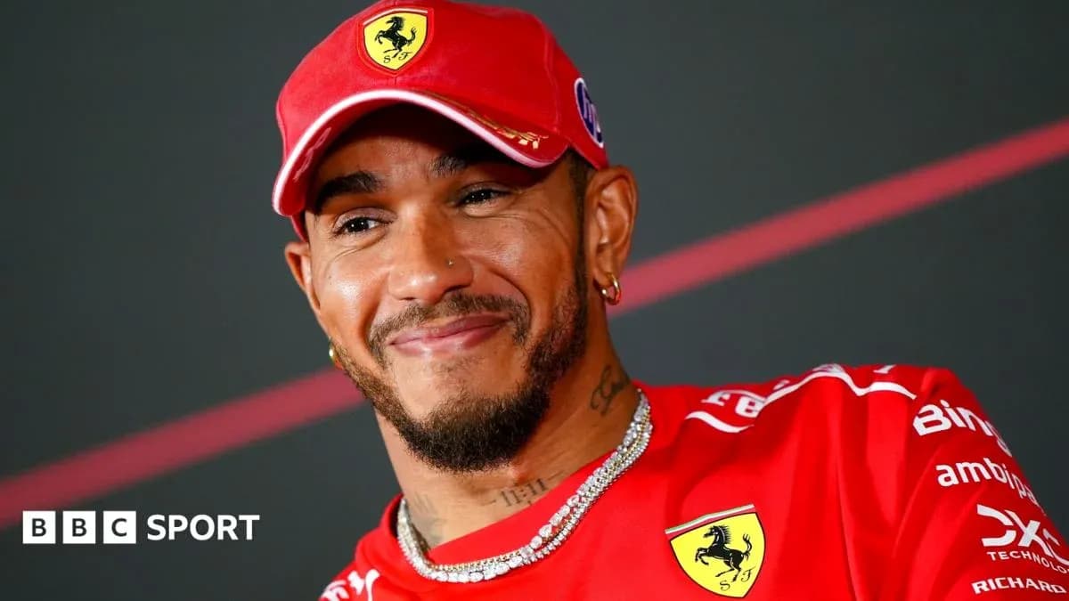 Driver in Ferrari cap during press conference