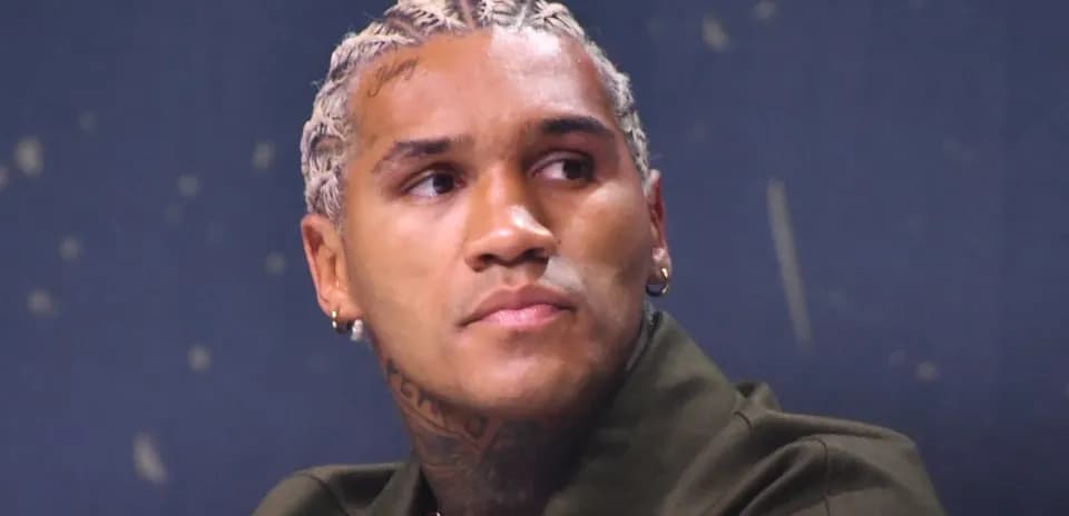 Athlete with braided hair during press conference