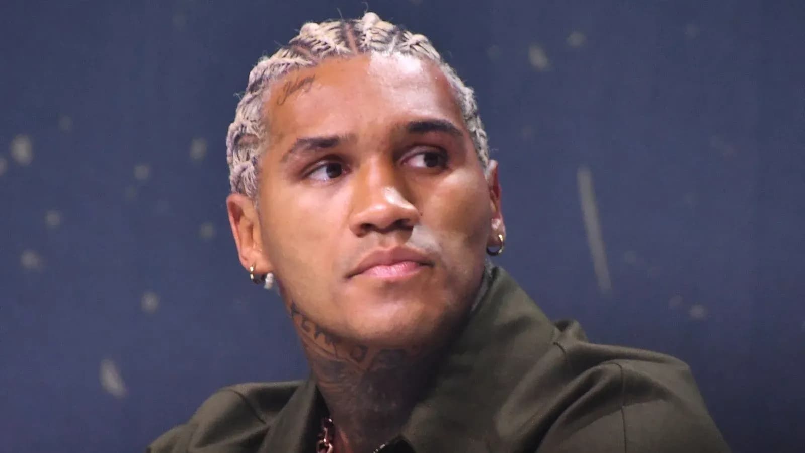 Athlete with braided hair during press conference