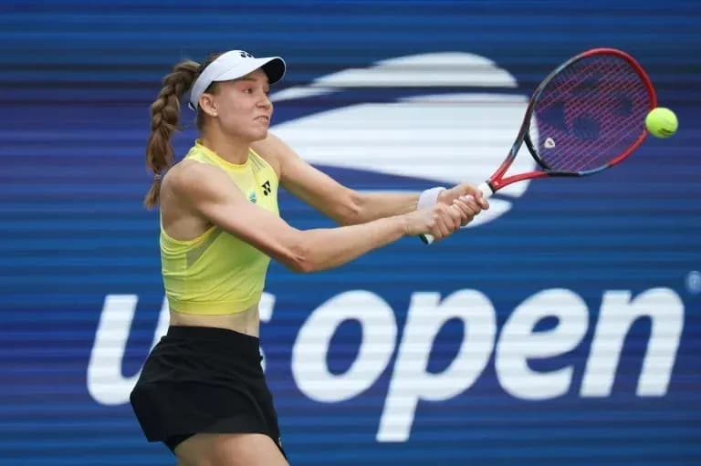 Player hitting a backhand during US Open match