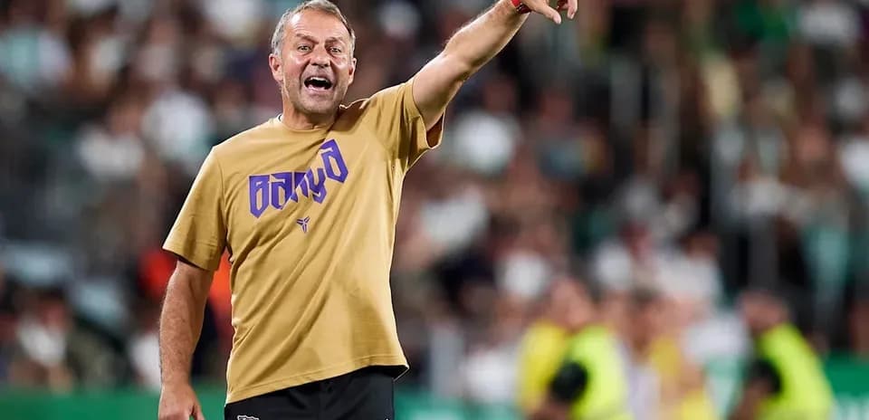 Coach directing players during a match on the sidelines