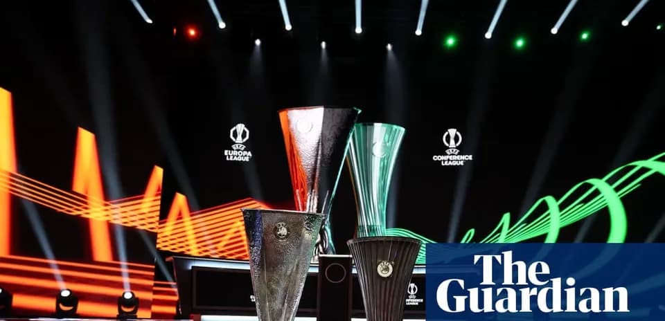 Three UEFA competition trophies on display