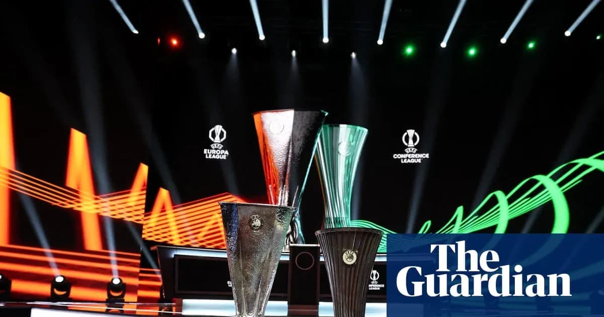 Three UEFA competition trophies on display