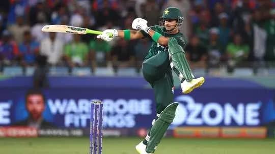 Batsman hitting ball during cricket match