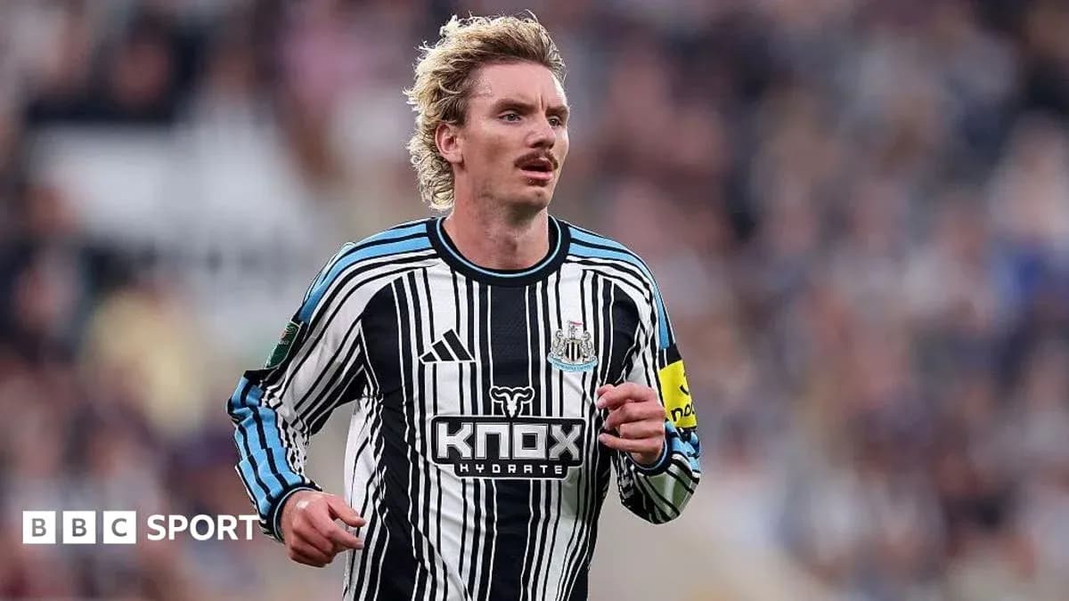 Newcastle player running on the pitch during match Newcastle player running on the pitch during match