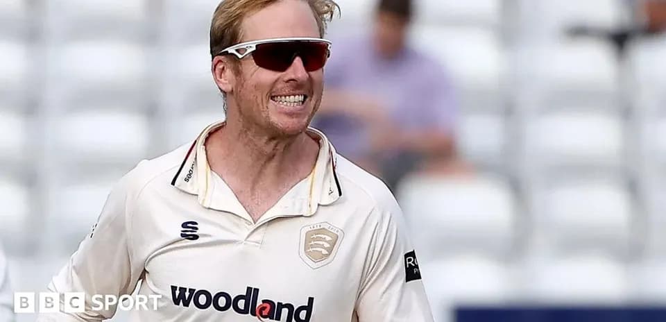 Cricketer celebrating a wicket on the field