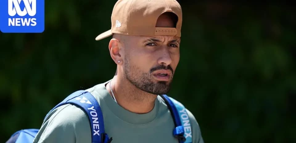 Tennis player wearing a cap and backpack outdoors