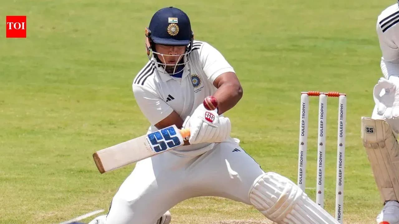 Batsman playing a shot during cricket match