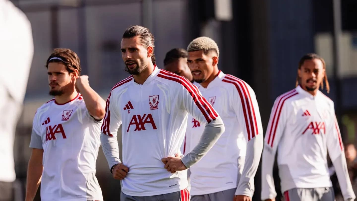 Players in Liverpool training gear during practice session
