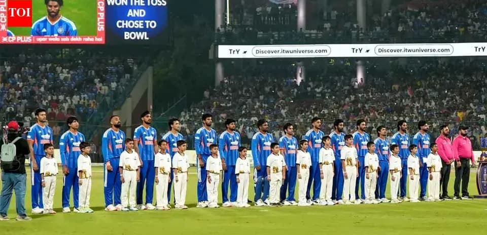 Players and mascots lined up before the match