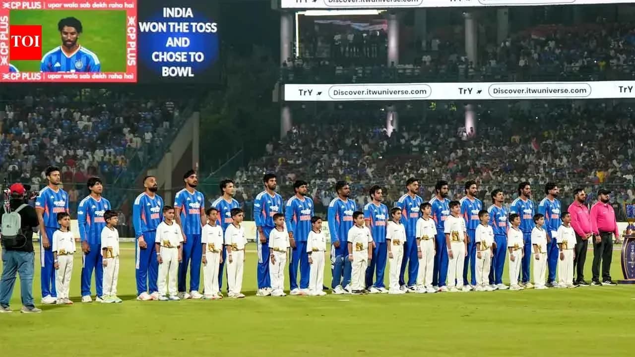 Players and mascots lined up before the match