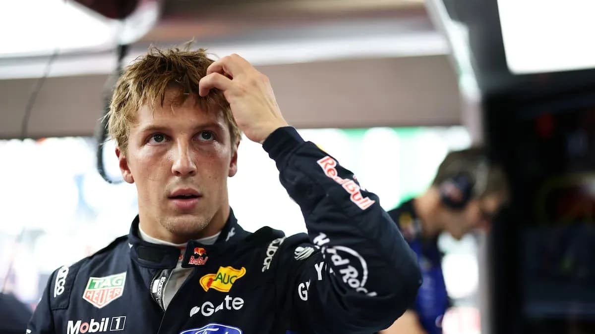 Driver adjusting his hair in the garage