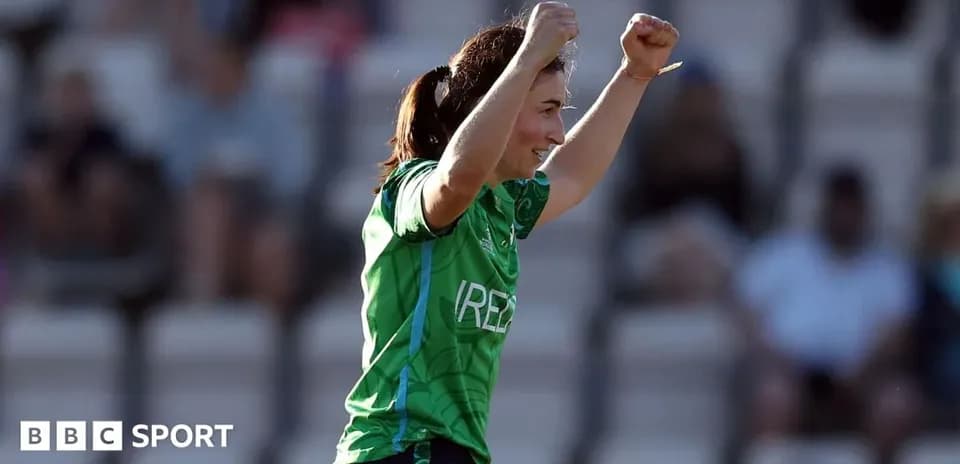 Player celebrating with raised arms during match