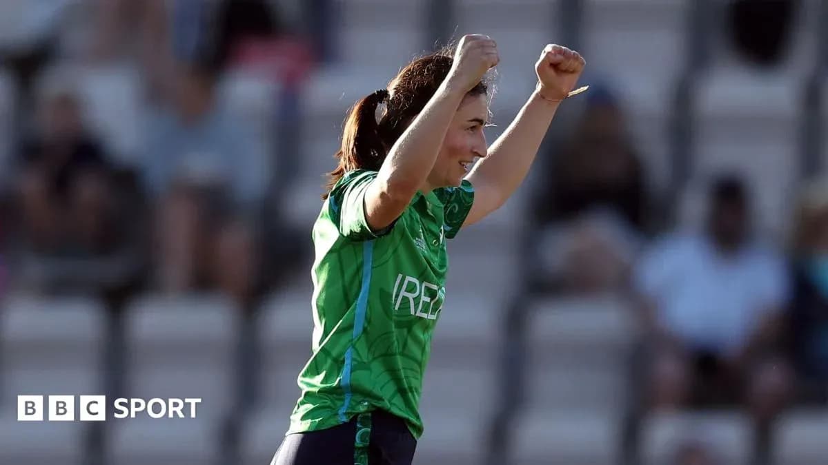 Player celebrating with raised arms during match