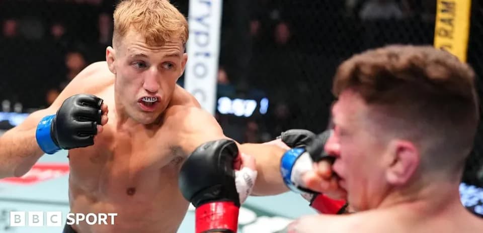 Fighter delivering a punch during MMA match