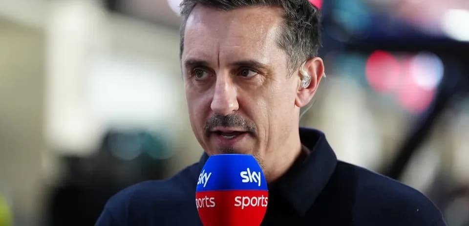 Sports commentator speaking into microphone during broadcast