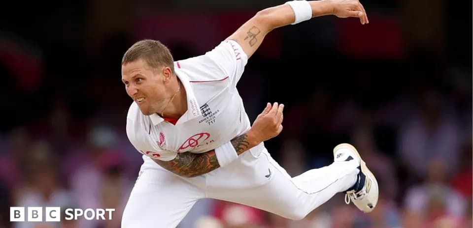 Cricketer bowling during a match