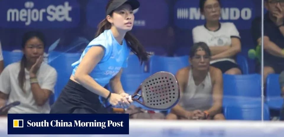 Female player preparing to hit a paddle ball