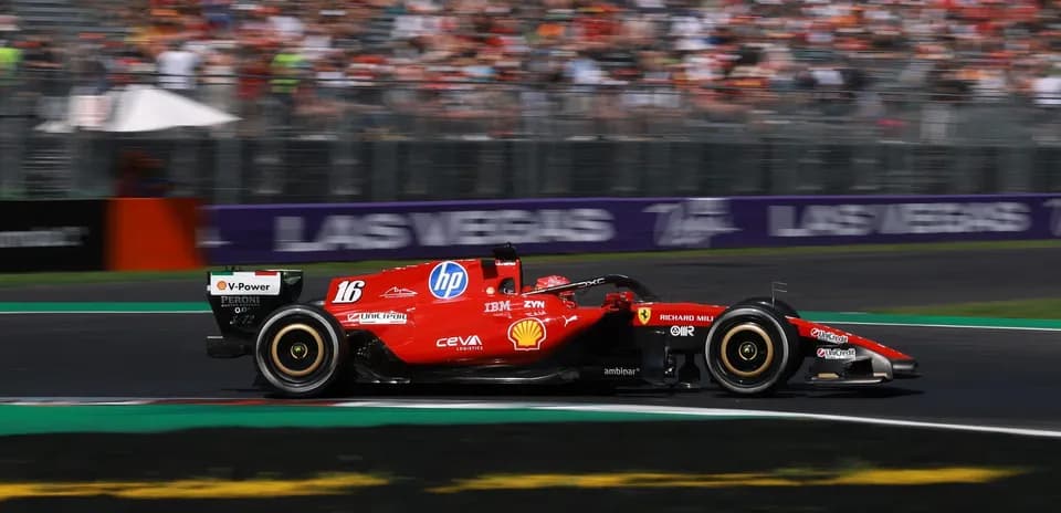 Ferrari F1 car racing around the track