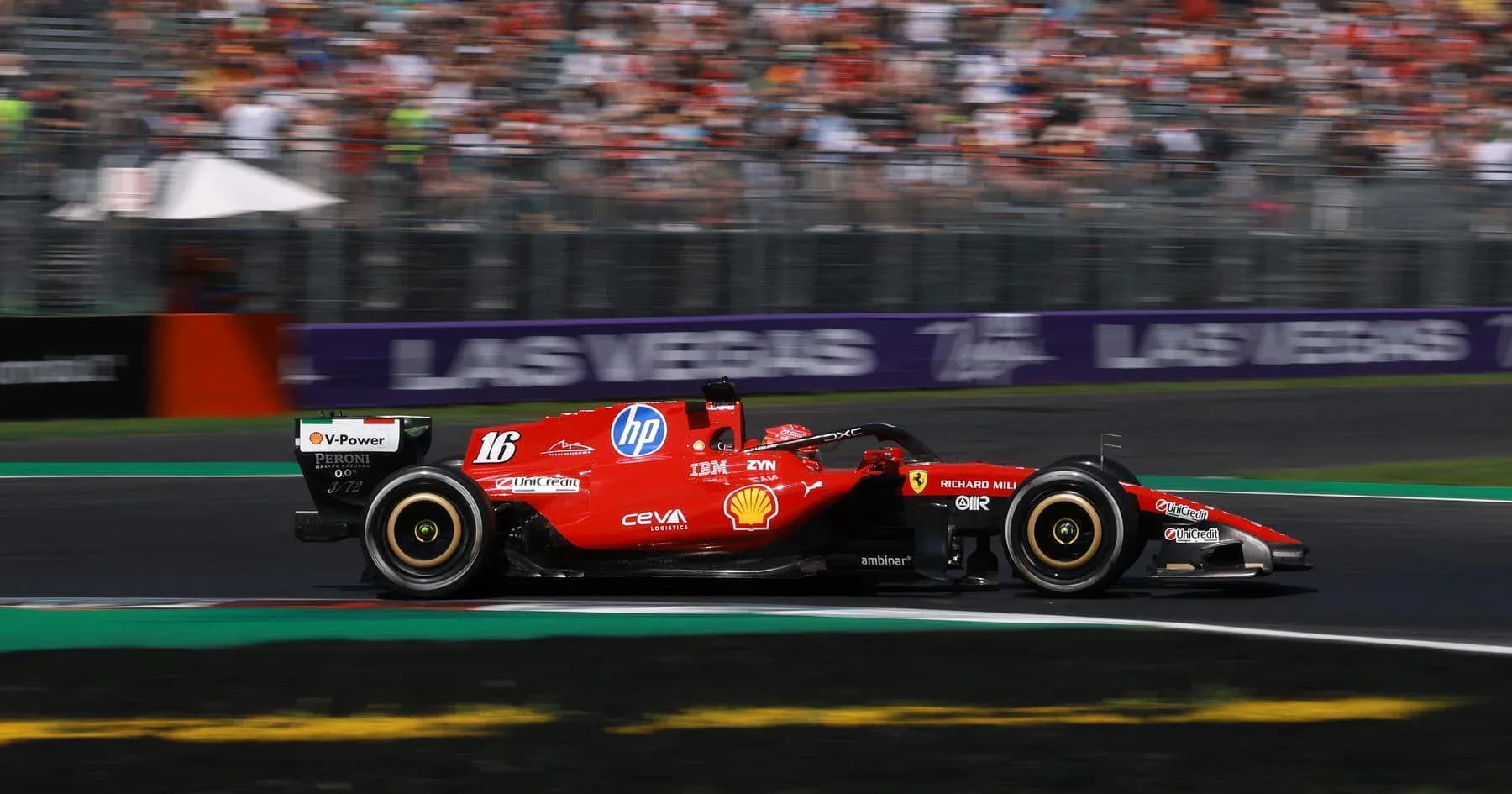 Ferrari F1 car racing around the track