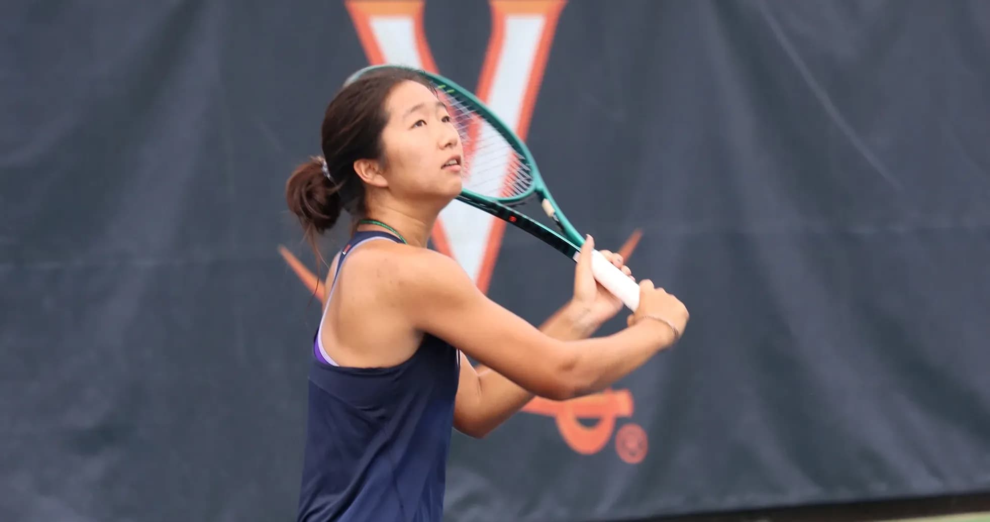 Tennis player preparing to hit a ball