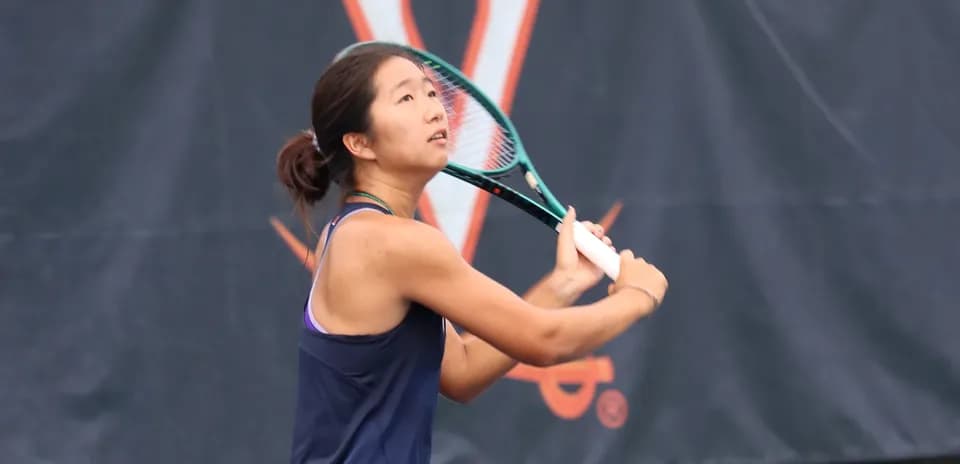 Tennis player preparing to hit a ball