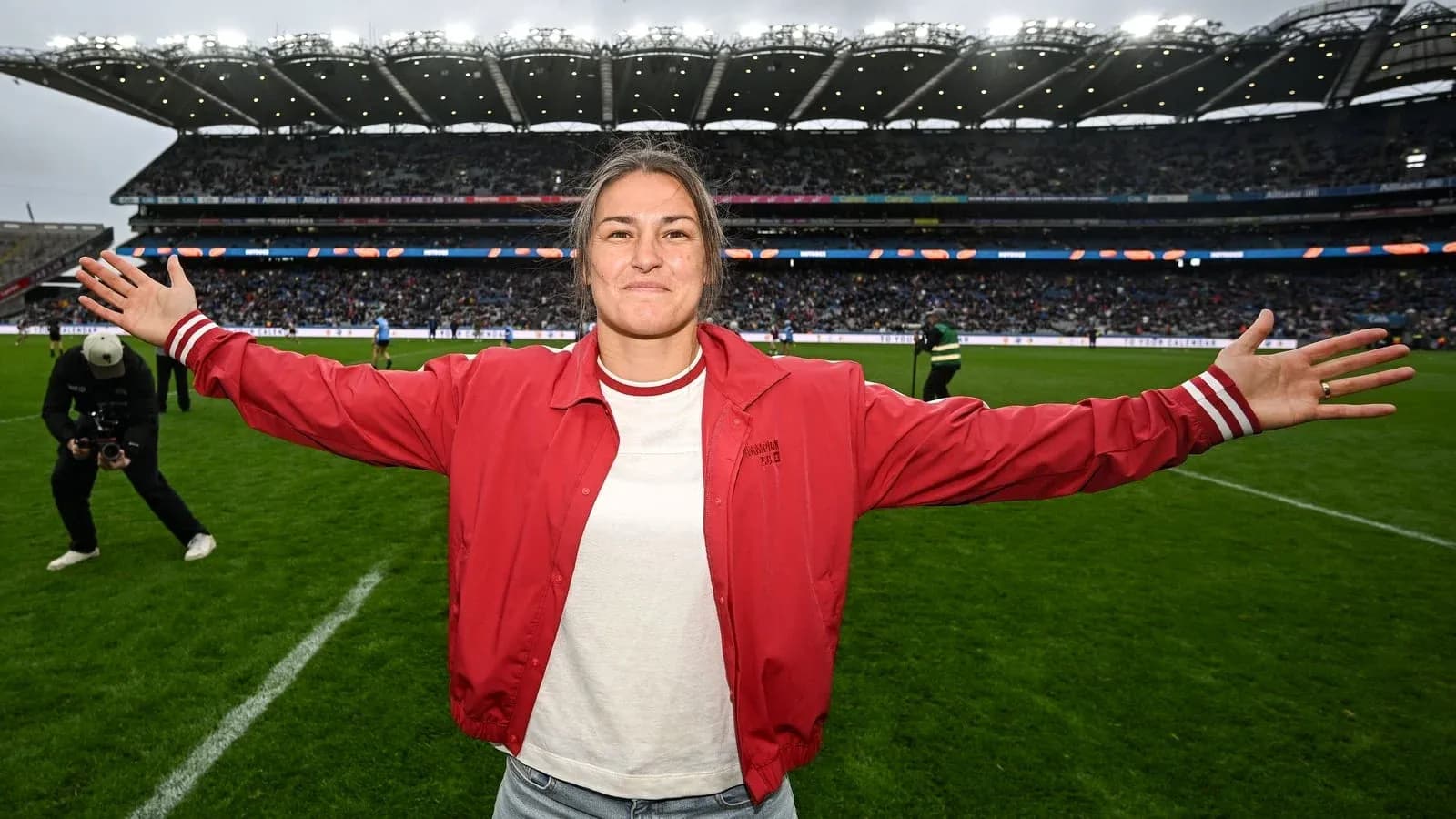 Person celebrating on the field at stadium