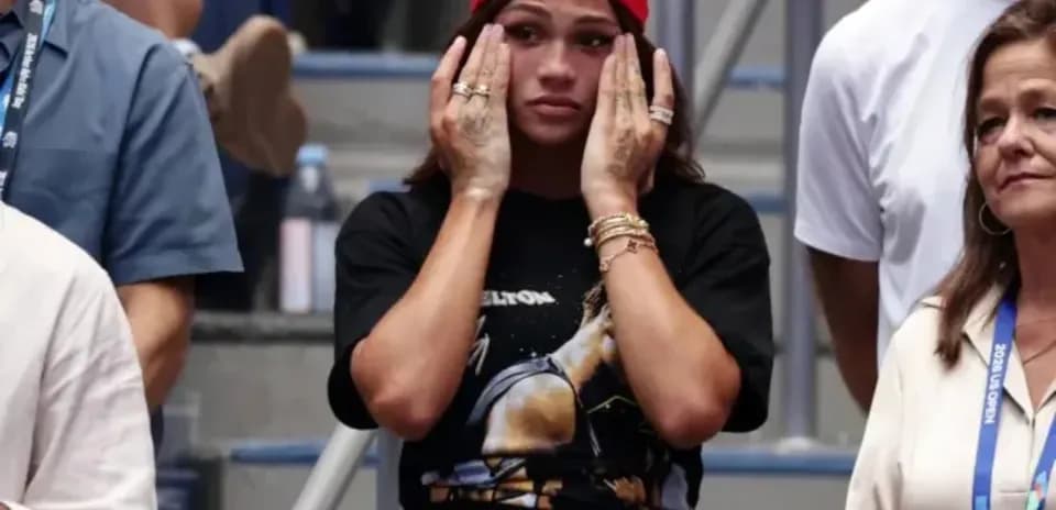 Spectators reacting during a tense moment at match
