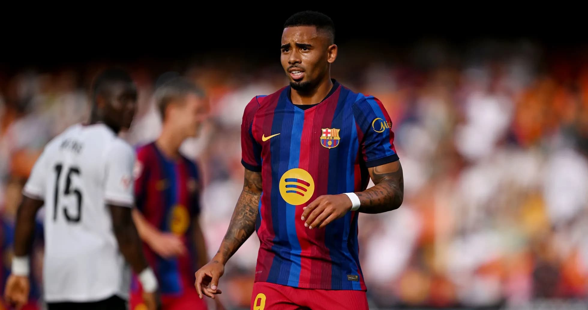 Barcelona player walking on the pitch during match