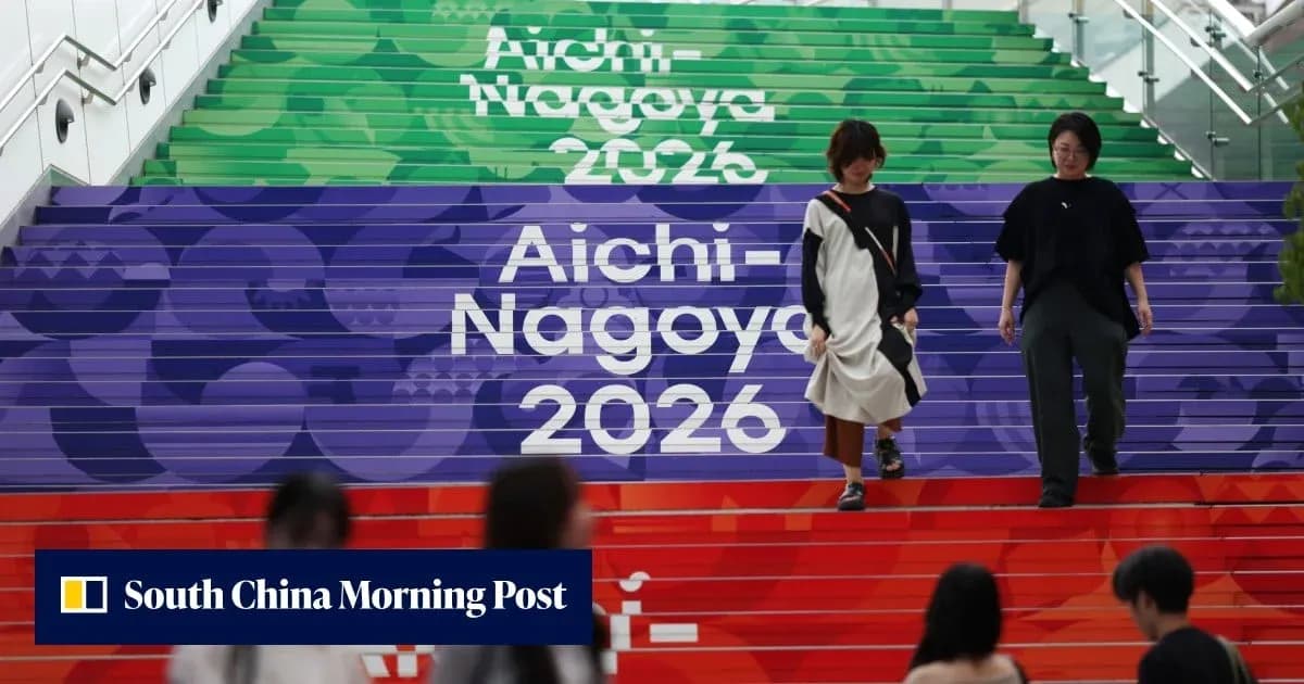 Two women walking down colorful Aichi-Nagoya 2026 stairs