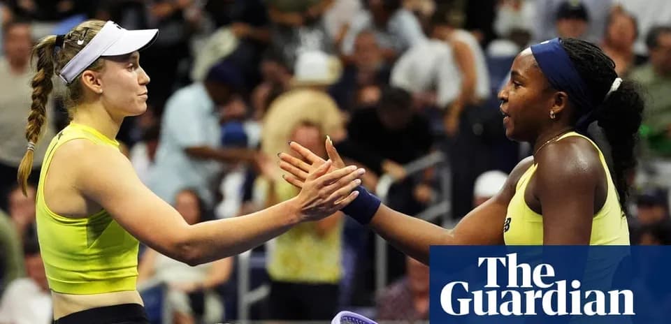 Two female tennis players shaking hands at match