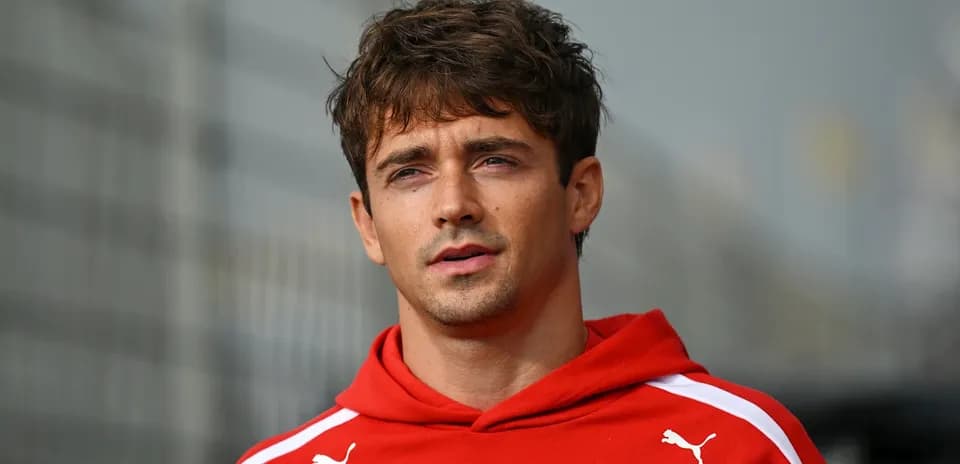 Athlete in red hoodie during outdoor event