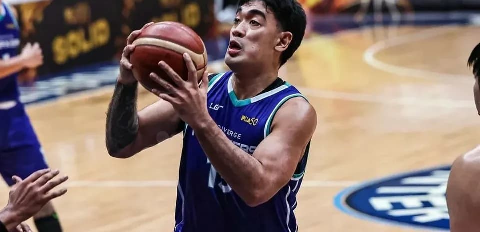 Player attempting a shot during basketball game