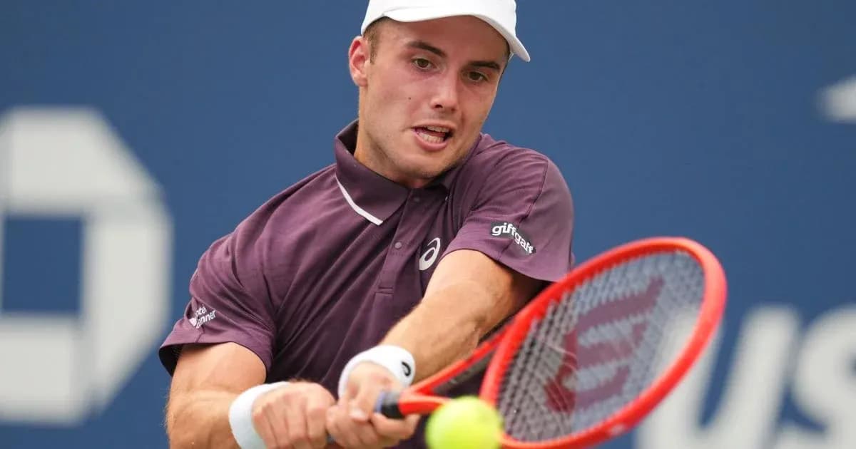 Player hitting a forehand during tennis match