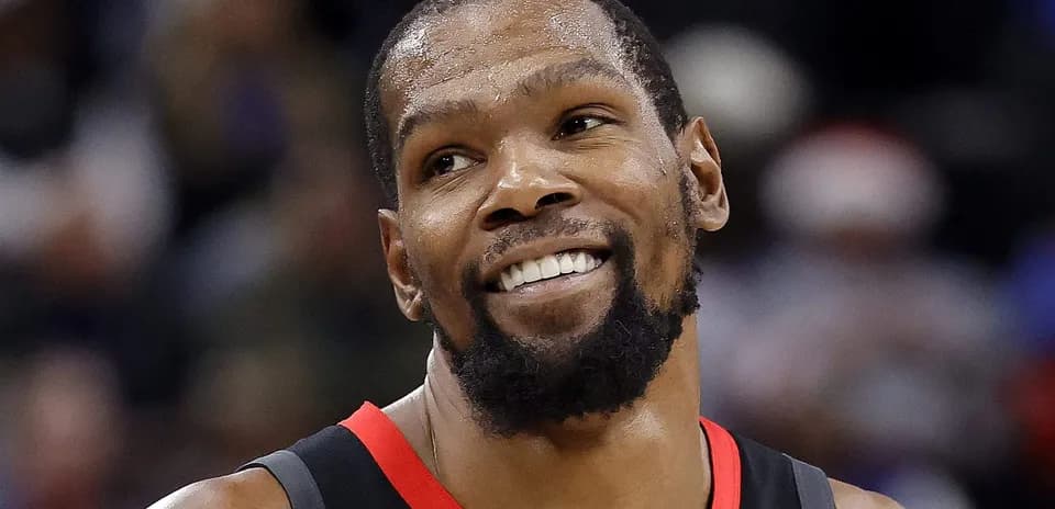 Kevin Durant smiling during a basketball game