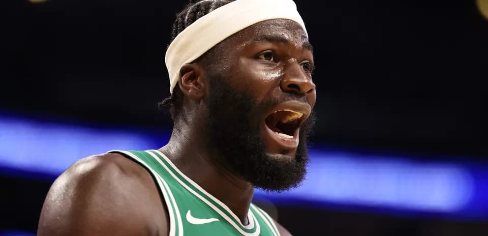 Player in green jersey celebrating during game