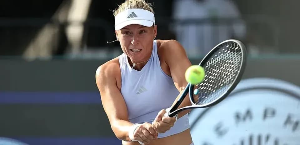 Female tennis player hitting a forehand shot