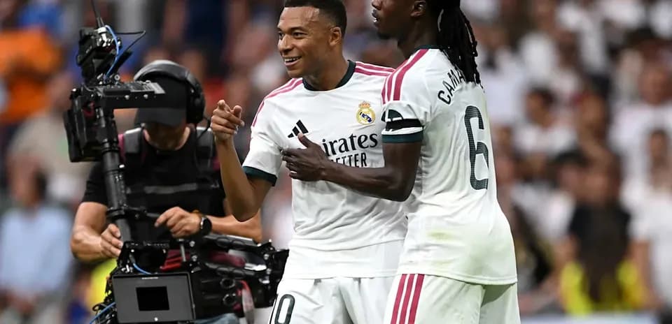 Kylian Mbappé celebrating with Eduardo Camavinga