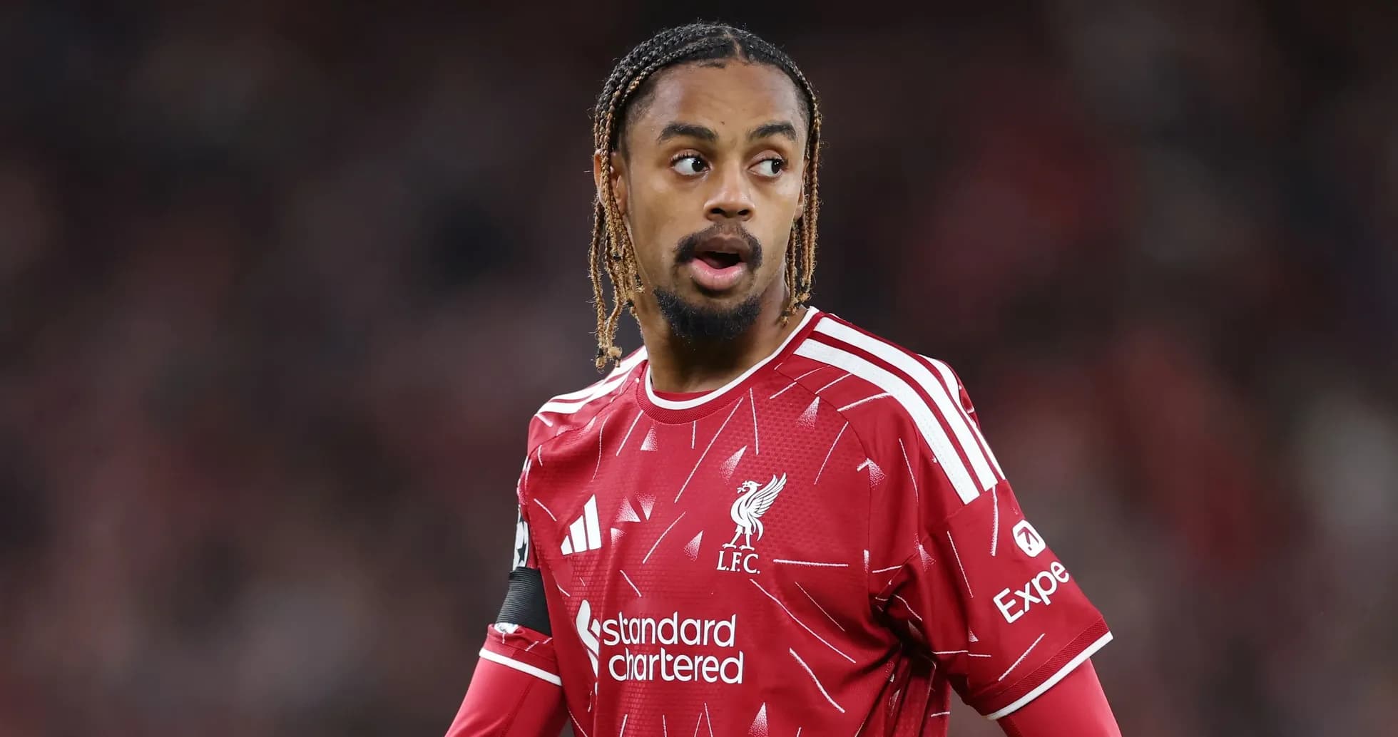Player in Liverpool jersey during match action