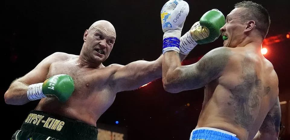 Boxers exchanging punches in the ring during match