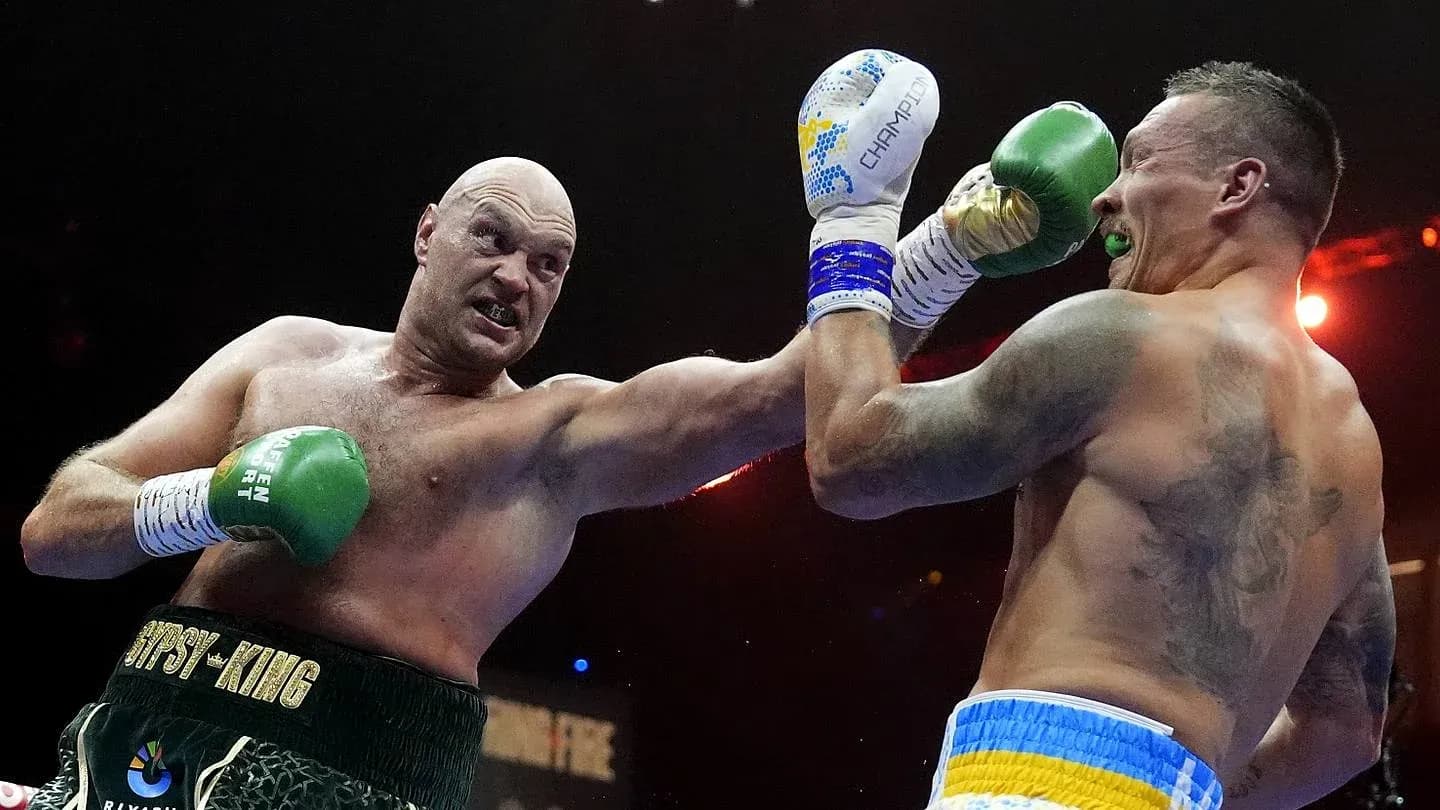 Boxers exchanging punches in the ring during match