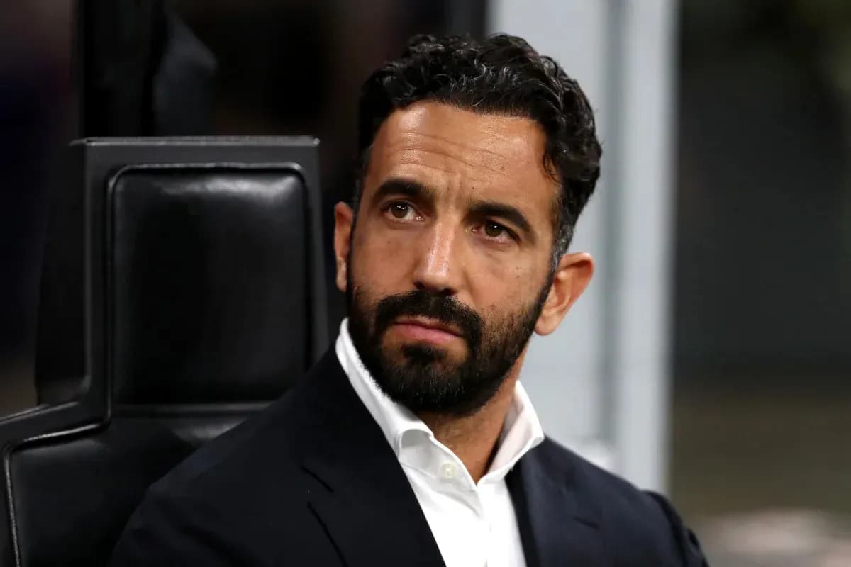Coach sitting on the bench during a match