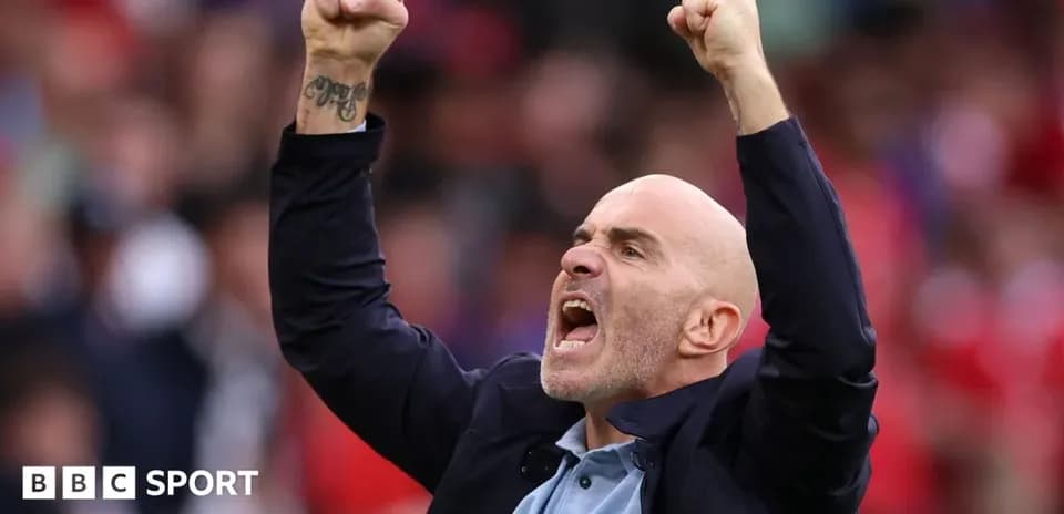 Coach celebrating passionately during a match