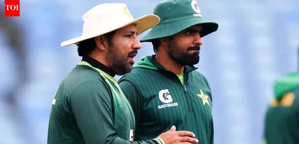 Two Pakistan players discussing during training session