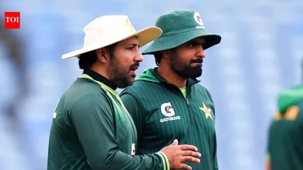 Two Pakistan players discussing during training session